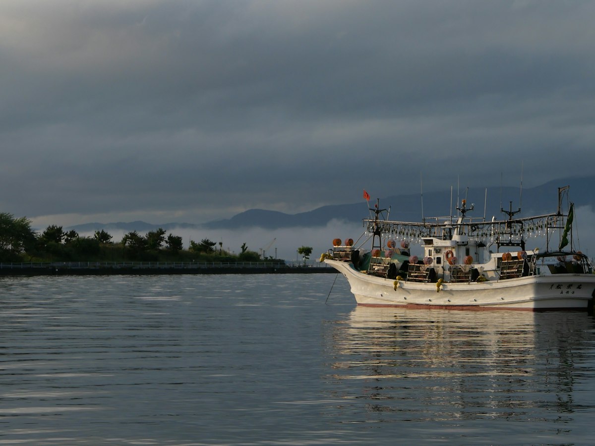 A fishing boat on calm water
